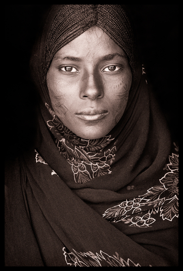 Girl from the Afar with facial scarification